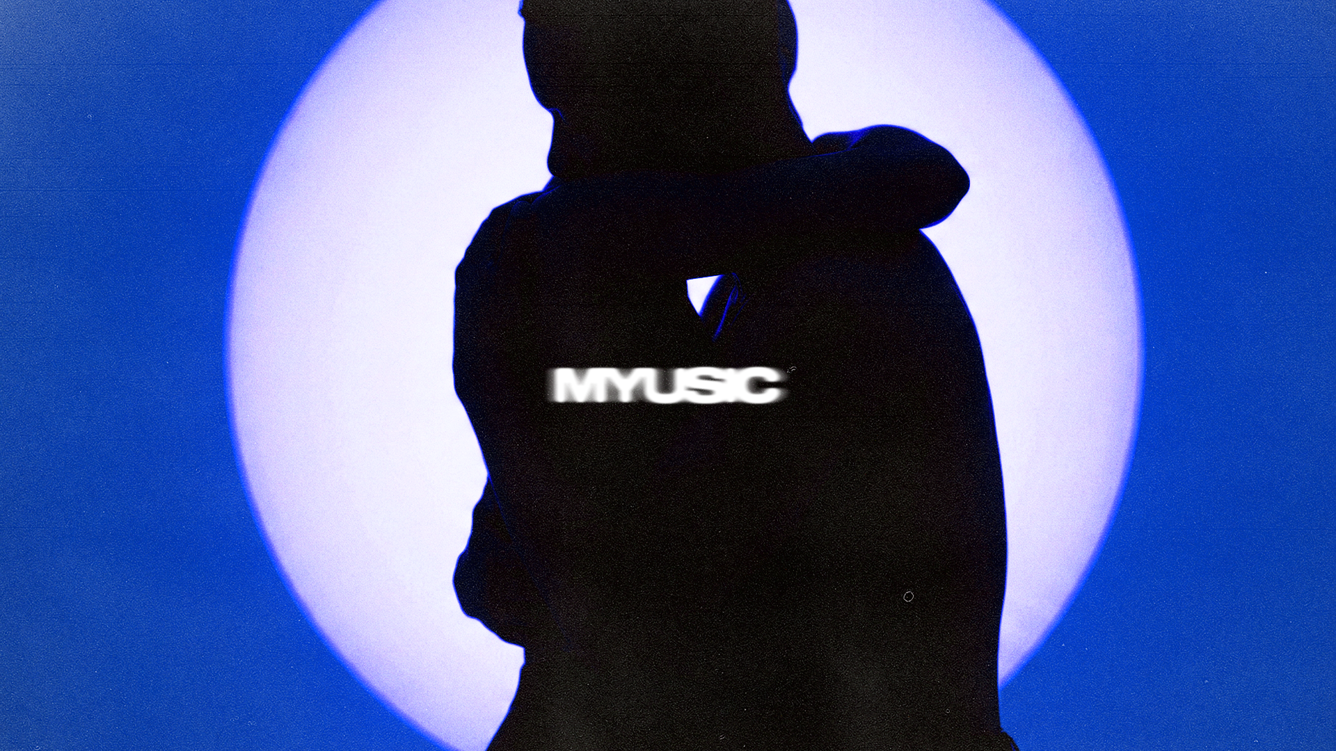 Close-up arms and torso, intimate and dark